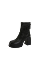 Black Leather Platform Ankle Boots for a Trendy Edge