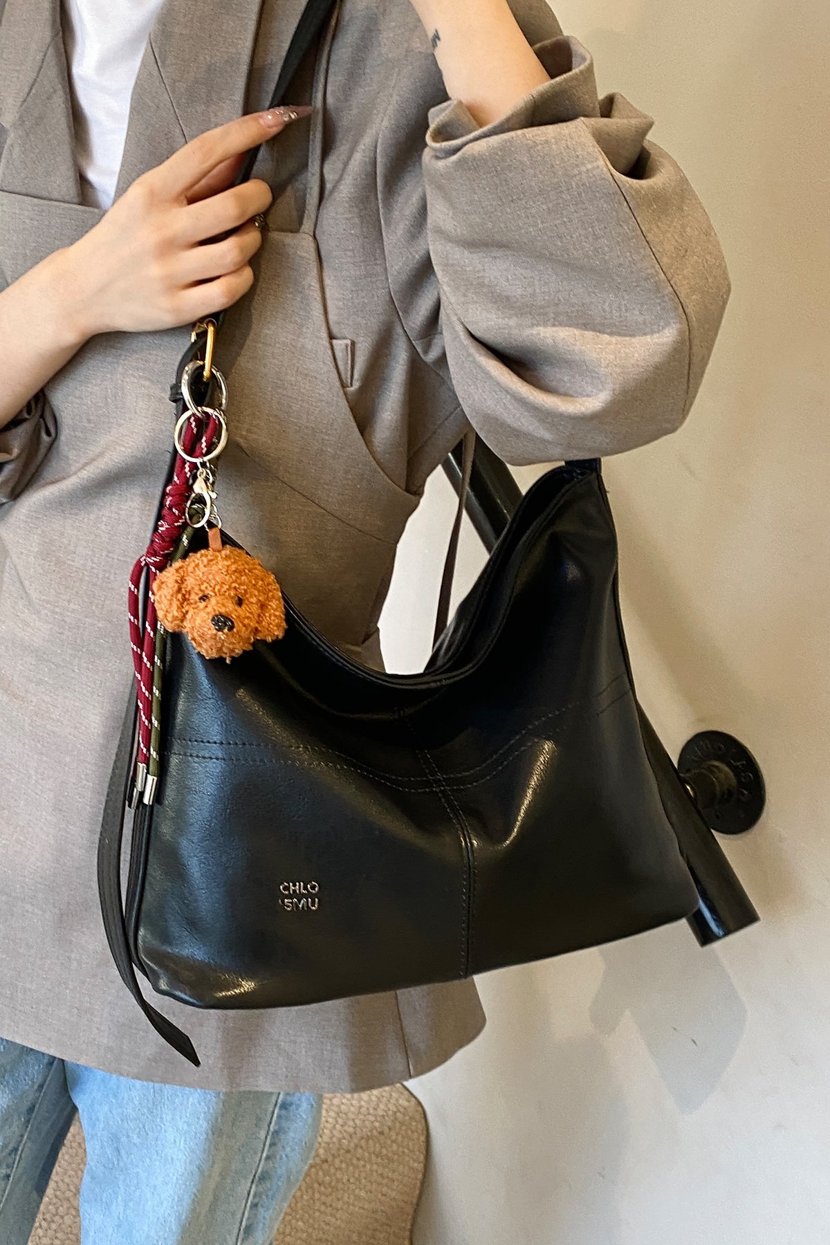 Black Leather tote with puppy charm M1165