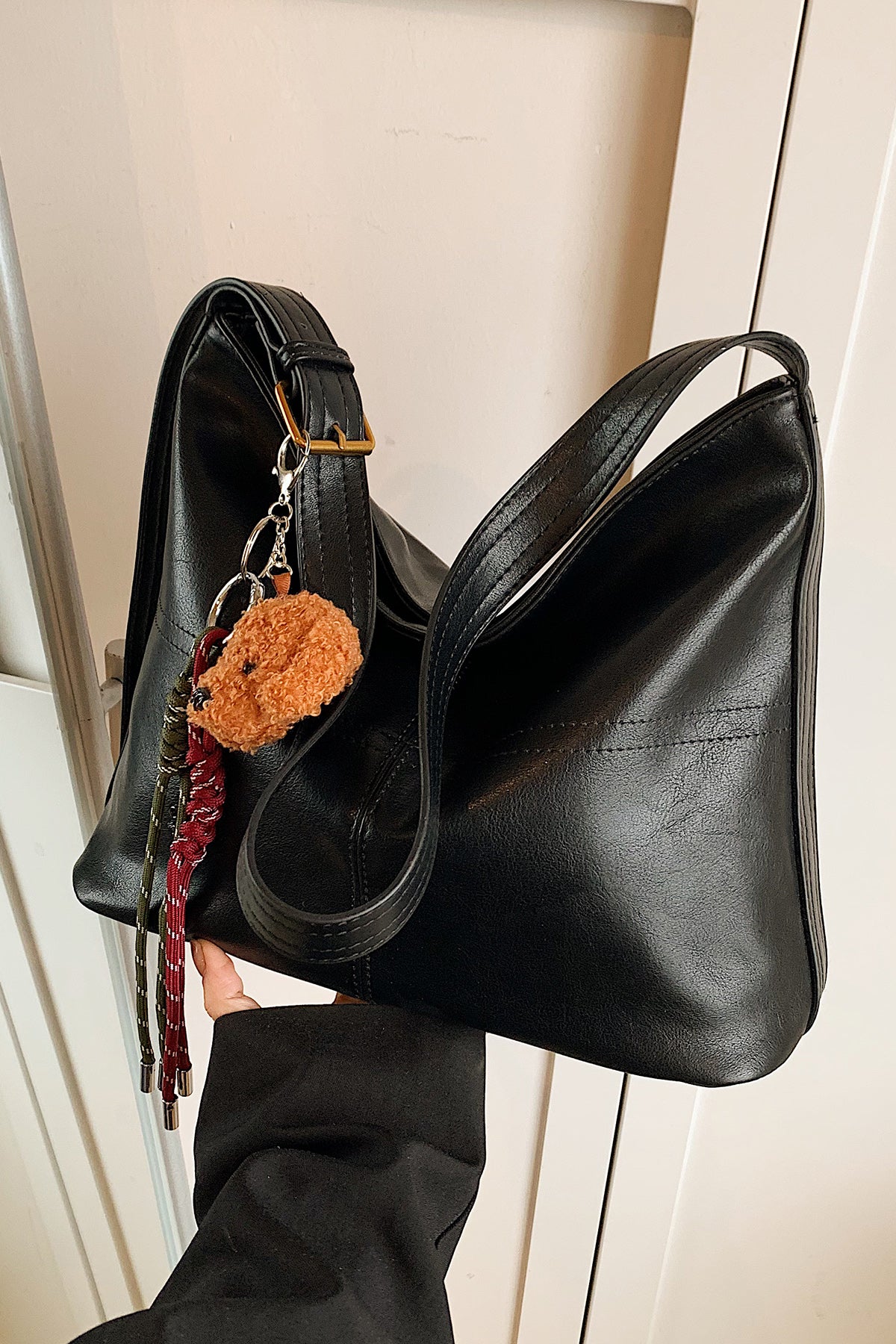 Black Leather tote with puppy charm M1165