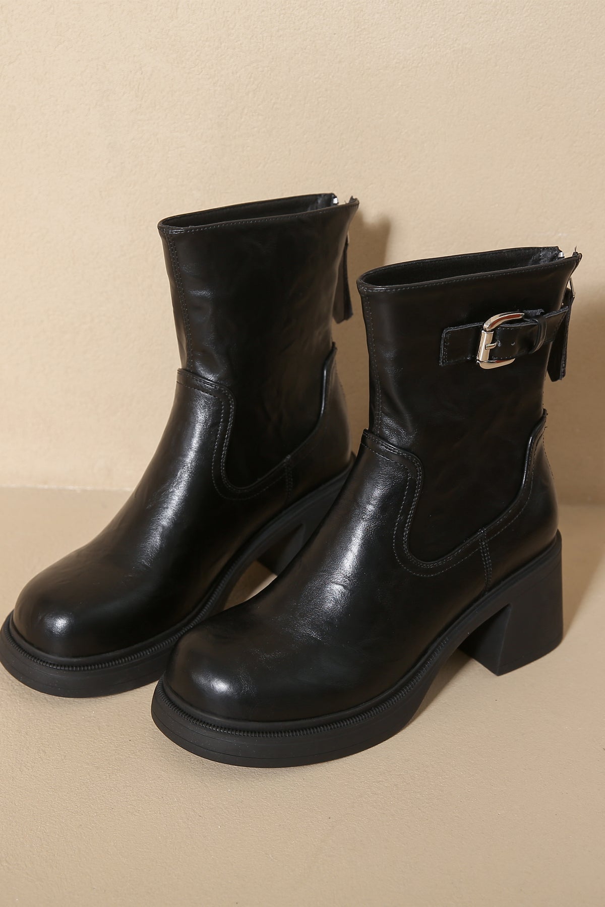 Classic black faux leather low heel boots for all seasons