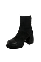 Modern black suede ankle boots with sleek leather toe for women