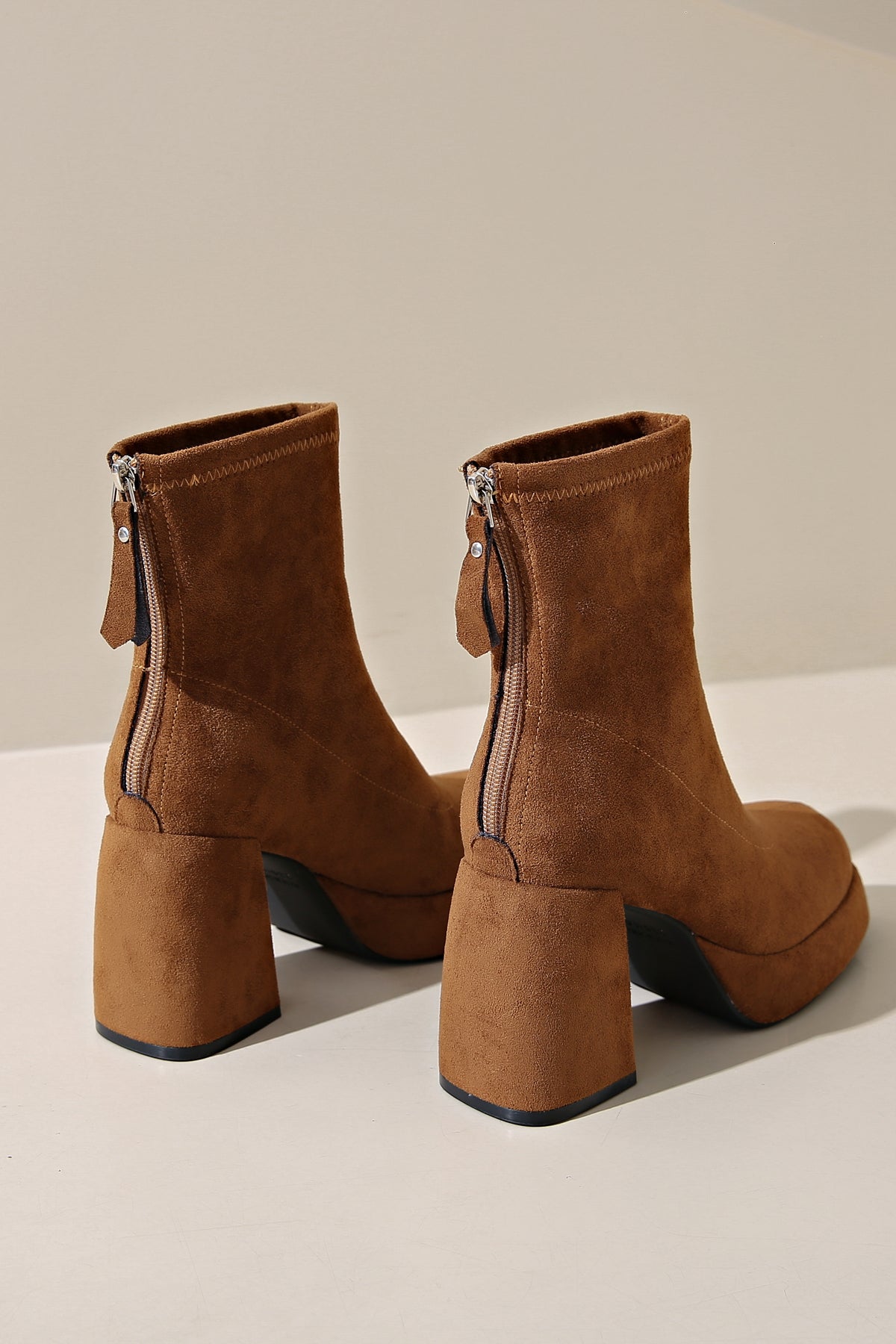 Modern brown ultra-fine suede ankle boots with low heel 