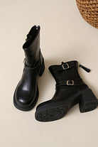 Stylish black faux leather ankle boots with metal buckle  