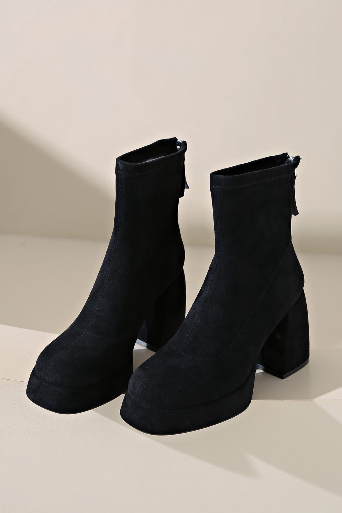 Stylish black ultra-fine suede low-heeled ankle boots