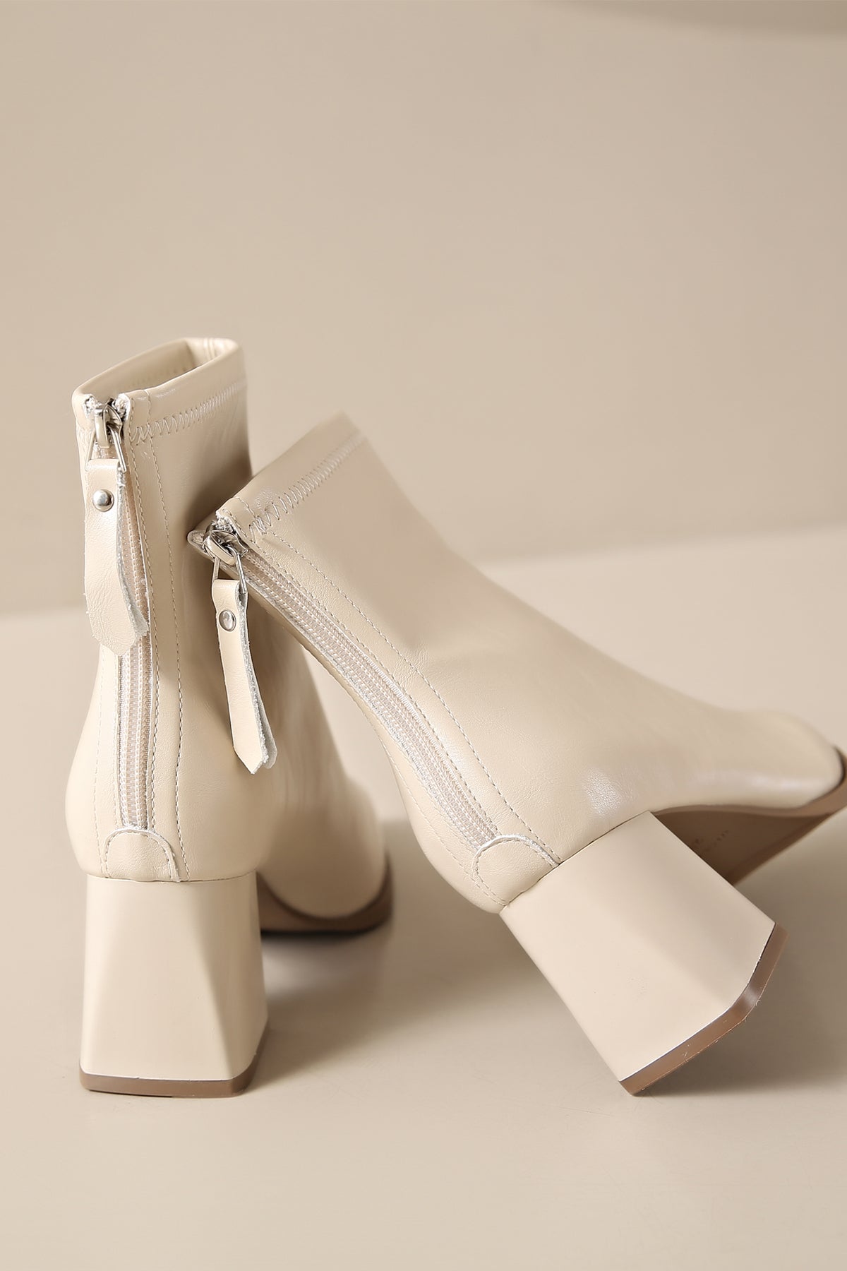 white leather low heel ankle boots timeless style and comfort